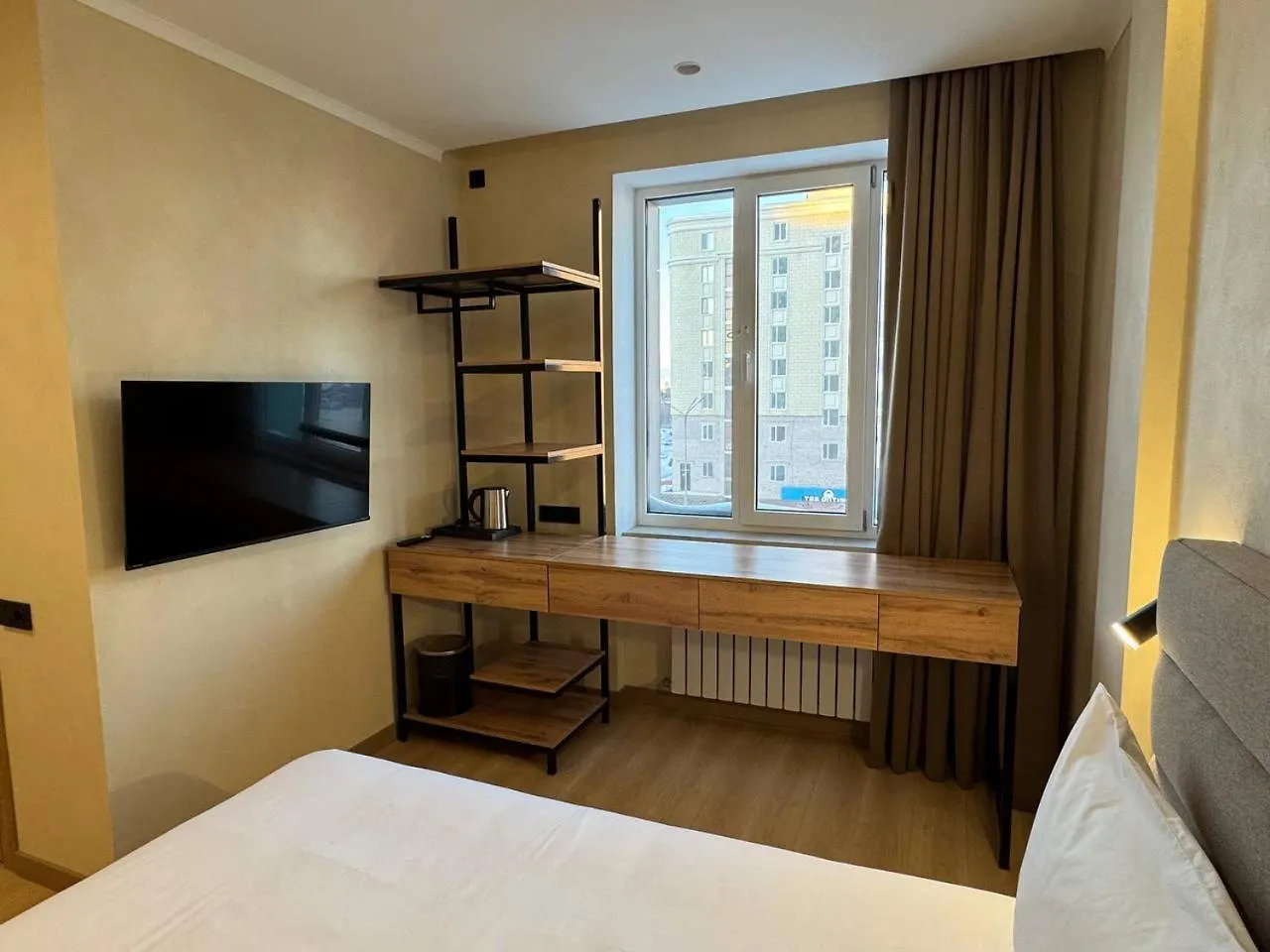 Tan Hotel Astana contacts